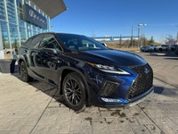 This 2021 Lexus RX 450h is bold and refined, expressing the Lexus design language with a striking fr... (image 3)