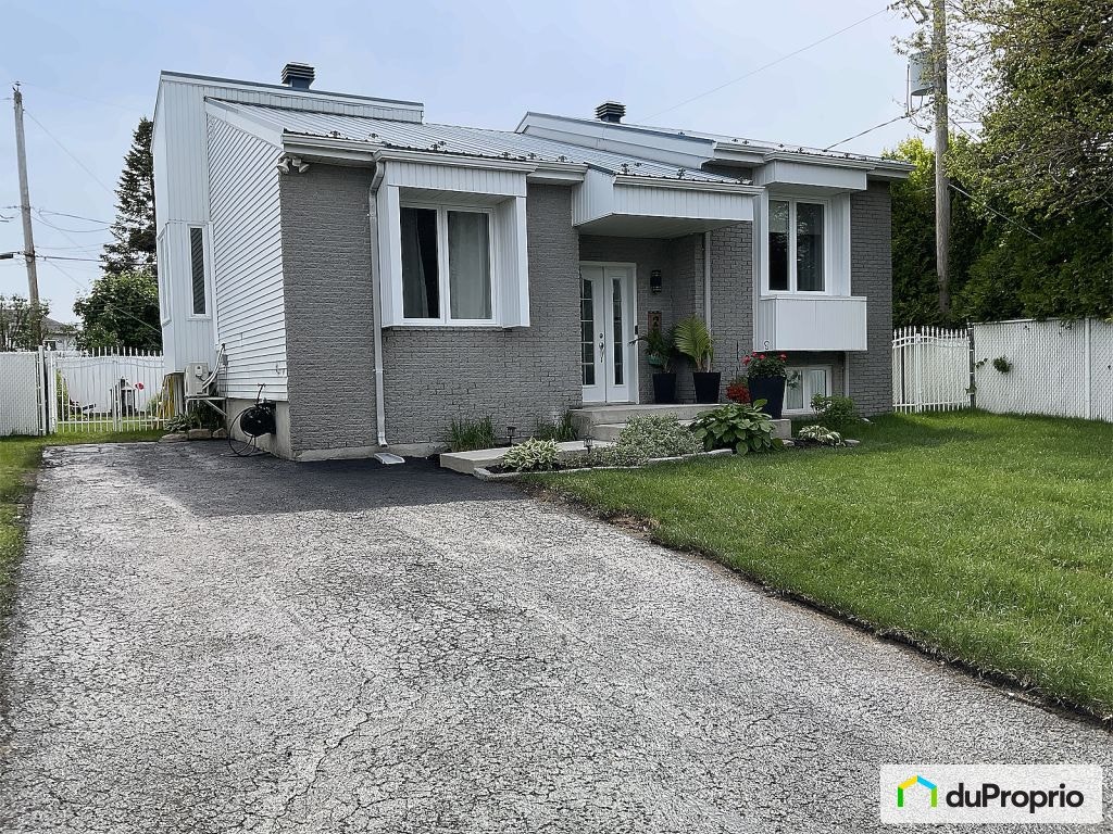 $575,000 - Bungalow for sale in Repentigny (Le Gardeur) — photo 1