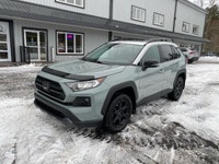 Introducing the 2021 Toyota RAV4 Trail in its captivating gray hue with AWD, designed for optimal co... (image 1)