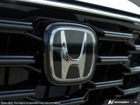 The 2026 Honda CR-V Sport AWD in White is a dynamic SUV, primed for superior handling with its all-w... (image 8)