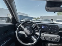 Embark on new adventures in the stunning 2024 Hyundai Kona Preferred Sport Utility, dressed in a sle... (image 8)