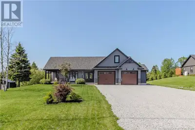 Youll fall in love with this custom-built Hampton home the moment you step onto the inviting wraparo...