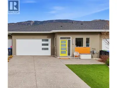 A pristine walkout rancher home with the best views of Black Mountain Golf course & walking trails t...