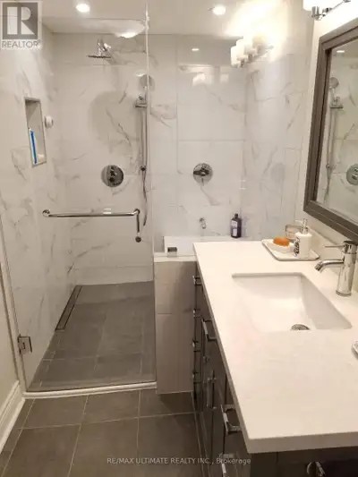 Welcome to this exceptionally spacious and bright lower-level apartment offering approximately 1,400...