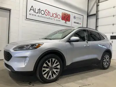Le Ford Escape Hybrid 2020 TITANIUM AWD CUIR MAGS CAMERA RECUL A/C CRUISE offert chez AutoStudio 72...