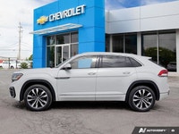 Command the road in this sleek 2023 Volkswagen Atlas Cross Sport Execline. This pristine Oryx White... (image 2)