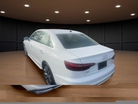 Drive in style with the 2023 Audi A4 Sedan Komfort 45 TFSI quattro, featuring an elegant white exter... (image 7)