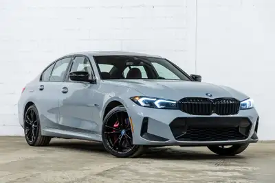 *English below* *Français:* Cette spectaculaire BMW 330e xDrive 2023 affichant 48 882 km, provenant...