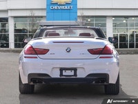 Experience the thrill of open-air driving in this stunning 2018 BMW 6 Series 650i xDrive Convertible... (image 3)