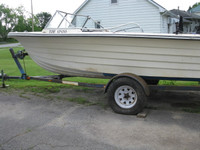 FISHING AND/OR SKI BOAT WITH TRAILER