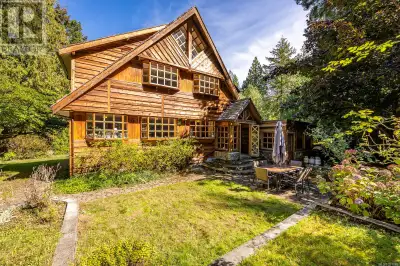 Large comfortable home nestled on the quiet side of Anderson Drive, located on beautiful Hornby Isla...