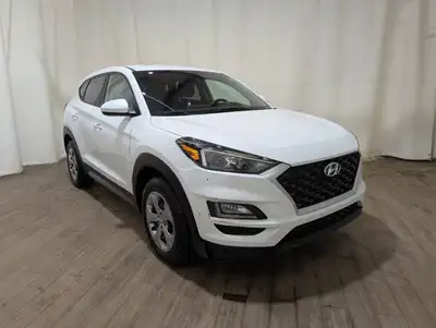 No Accidents! Brand New Tires!The 2021 Hyundai Tucson Essential AWD, elegantly dressed in a pristine...