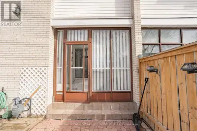 Largest unit in the complex! This bright end-unit townhouse offers an open-concept layout, generousl...