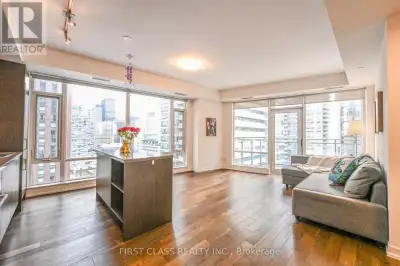 Welcome to the largest 1-bedroom corner suite in the iconic Cinema Tower, offering unobstructed sout...