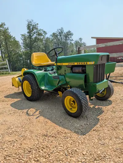 John Deere 112 with rototiller, View more