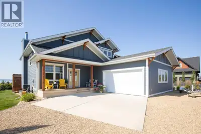 This custom-built property holds a premium location in Meridian Beach, a lakefront community on Gull...