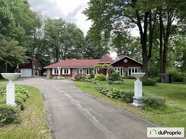 $965,000 - Bungalow for sale in St-Ambroise-De-Kildare — photo 1