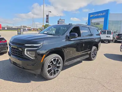 Experience the 2026 Chevrolet Tahoe RST: a bold black 4x4 SUV with a powerful 8-cylinder engine desi...