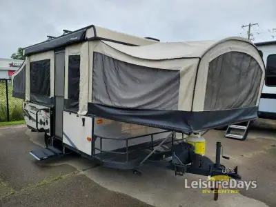 The Jay Series 1209SC folding pop-up camper by Jayco offers a front king tent bed and a rear queen t...