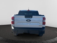 Check out this vehicle's pictures, features, options and specs, and let us know if you have any ques... (image 3)
