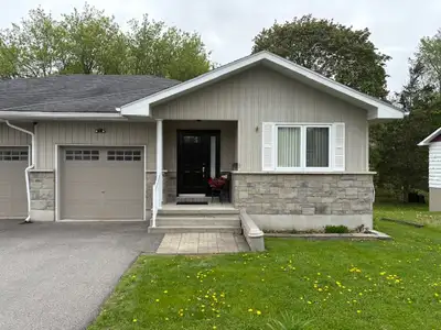 Sit on your deck and enjoy the stream running through the back yard or walk to the Riverfront walkwa...