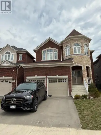 Stunning Brick & Stone 4-Bedroom Home Backing Onto Ravine/Golf Course!Welcome to this beautiful, lik...