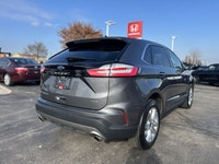 Seamlessly merge dynamic performance with premium comfort in the 2024 Ford Edge Titanium. Finished i... (image 4)