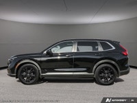 The 2025 Black Honda CR-V Hybrid Touring AWD is your gateway to balanced power and superior handling... (image 2)