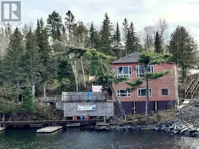Live & Work the Dream on the shores of LOTW...Two+ bedroom year-round home with insulated heated gar...