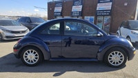 Turn heads and rediscover the joy of driving with this classic 2005 Volkswagen Beetle in a stunning... (image 7)