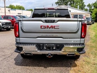 The 2023 GMC Sierra 1500 SLT Crew Cab Short Box 4-Wheel Drive in a refined gray finish offers except... (image 3)