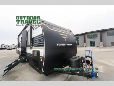 Prime Time Avenger travel trailer 26DBS highlights: Large Slide Out TV and Fireplace Oversized Windo...