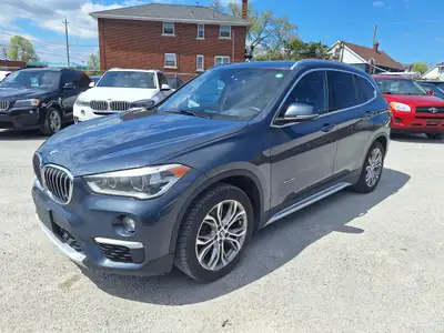 2016 BMW X1 AWD, 2.0L 4 Cyl, Power locks, Power widows, Cruise control, AM, FM, CD, Bluetooth, Navig...