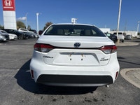 Navigate your daily commute with exceptional efficiency and advanced safety in the pristine white 20... (image 5)