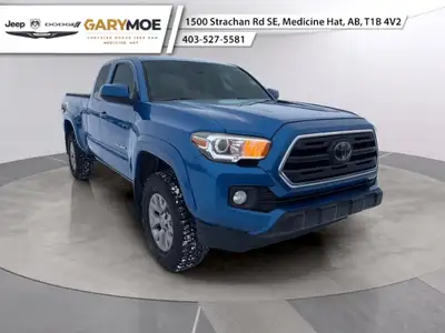 The 2018 Toyota Tacoma SR5 in a striking Blue offers an impressive 4x4 drivetrain, ensuring robust h...