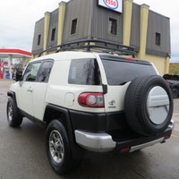 This 2013 Toyota FJ Cruiser offroad 4WD model, adding Bilstein shock absorbers, traction control upd... (image 6)