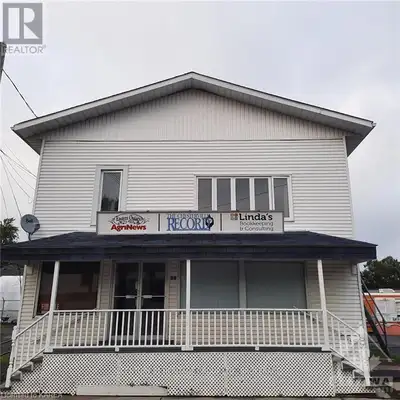 Explore this multi-use property, near the waterfront. Includes 3 residential units, a customizable c...