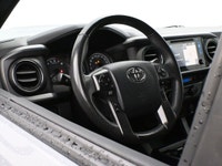 Get ready to take on any terrain with confidence in this 2019 Toyota Tacoma TRD Sport a truck that p... (image 6)