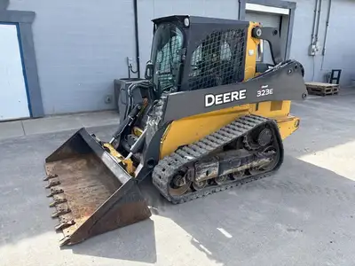 2015 John Deere 323E Compact Track Loader (skid steer). 3477 hours. Cab w/ heat, AC, air ride seat,...