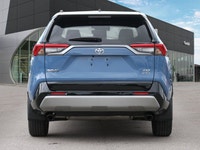 The highly anticipated 2025 Toyota RAV4 Hybrid XSE, a striking light blue Sport Utility with a sophi... (image 4)