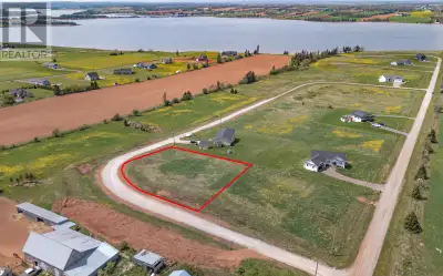 An outstanding corner lot offering beautiful panoramic water views. Located in Fairview Meadows, thi...