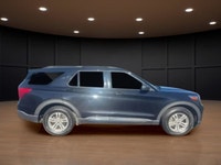 The 2020 Ford Explorer XLT in striking black with a 4×4 drivetrain is designed to handle both urban... (image 4)