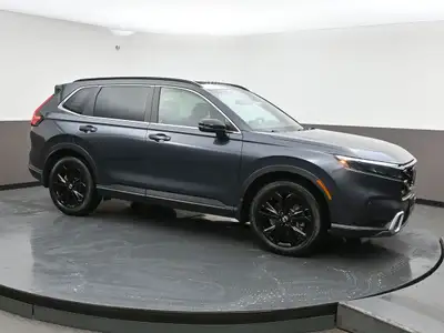 One owner just traded and fully O'Regan's Green Light Certified this CR-V Touring Hybrid features a...