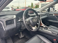 Command sophisticated comfort for every journey in the spacious 2019 Lexus RX 350L, gleaming in an e... (image 9)