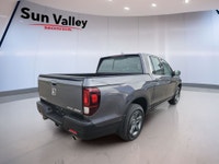 The 2023 Honda Ridgeline offers a blend of luxury and convenience with its keyless entry and remote... (image 4)