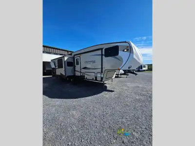 Step inside this Coachmen Chaparral Lite fifth wheel model 29RLS which features a rear living layout...
