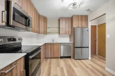 Newly renovated suite featuring brand-new appliances and convenient in-suite laundry. A fresh, moder...