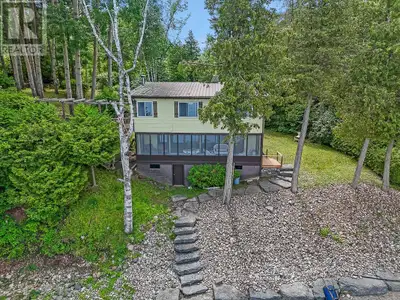 YOUR SEARCH IS OVER! 200 FEET OF PRISTINE WALK-IN WATERFRONT! Welcome to your charming riverfront ge...