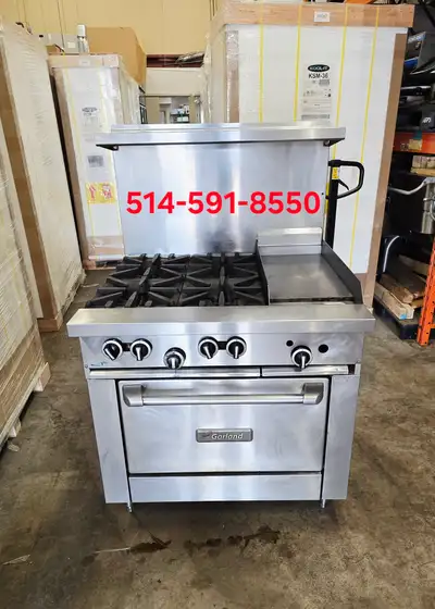 Cuisinierer commercial Garland 36" de large au gaz naturel. 4 feu puissant et plaque de 12". Tres pr...