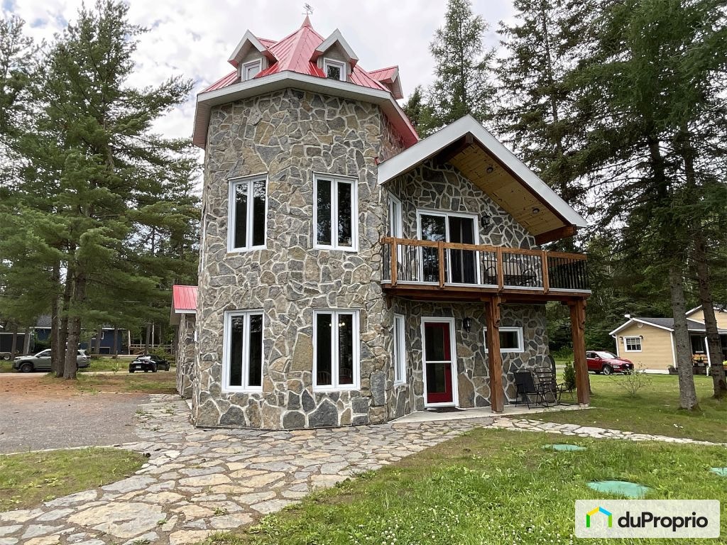 $629,000 - Bungalow for sale in St-Ambroise — photo 1